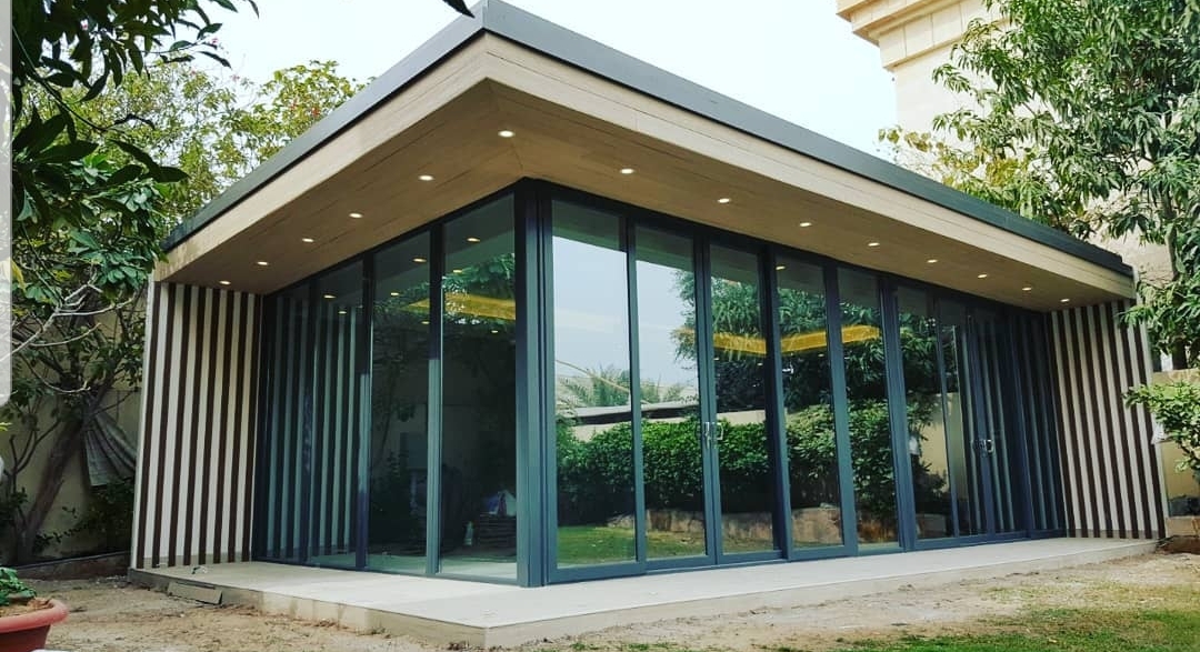 Custom-built glass room enclosure with aluminium framing installed in Dubai villa